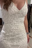This dress fit like a glove. Not snug, just fell on my curves beautifully. Unfortunately, it was a little too simple for what I wanted. - Jaime L.