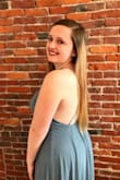 This dress is fantastic! The color is gorgeous and it fits true to size. It was a bit longer than I anticipated, but with four inch heels I was fine. Definitely would recommend! - Alexa O.