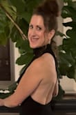 This is a stunning dress. Visually, it really is so sexy and breathtaking. My only issue was the side boob. I am very small chested - 36 B and nursed 3 kids, IYKYK. I did use tape to shimmy them up and double-sided tape to keep the dress closed, but I ended up just not lifting my arms up too high by the end of the night. Still a great dress. I wore it to a black tie event. I did need to hem even with wearing 2 inch heels.

5'3"
127-129 lbs
Size Small - Stacey Z.