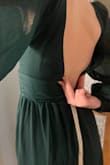 I ordered an xs, my typical size, and not only was the dress about 6" too long, but there was a good 4" gap that couldn't be closed to zip up the back. Somehow, the dress runs small and runs big. - Stephanie P.