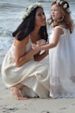 I used this dress for a super casual wedding dress and it went perfect for  the occasion. It fit a little long but everywhere else it fit fine. I ordered a small. - Amanda I.