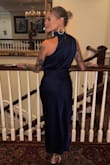 This is true to size. Very classic, and not revealing at all! I recommend. - Amber T.