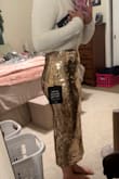 I'm athletic build, 180lbs with a smaller waist. I ordered the skirt in a medium and large. Both fit, but I like a more straight look, so kept the large. The pic is of the large. - Rachel B.