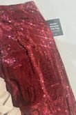 What happen to lulus quality? I feel the quality of the last two pieces of clothing ordered has gone down dramatically. This skirt is pretty. However, the burgundy color is only on one side of the sequin, so if you rub or touch (and along the seam), there is this horrible bright yellowish gold sequin. If I didn't have an event to attend, I would send it back. I cut a lot of the gold sequins out, which takes a lot of work. This, unfortunately, has closed my chapter with lulu purchases. - Jasmine R.