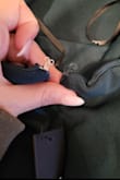 Arrived damaged, the hook and eye at the top of the dress was literally already ripped off from one side of the dress. When I tried to look to put on the dress, the zipper pull was at the bottom of the bag, and it had come undone from the dress at the bottom of the zipper because the bottom of the zipper was not properly sewn closed - McKell C.