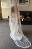 Loved the idea of a pearl veil, but the color just did not go with any of my dresses that I tried on. It almost glows, it's so bright. The length and quality were fine, but it just was not for me. I added photos to compare it to the veil I ended up choosing. It makes the other veil look dingy, but it is not, I promise lol - Abby K.