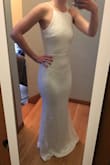 After the dress I ordered from a bridal shop arrived and was a complete disaster, I turned to Lulus. This dress is the exact cut and fit that I was looking for. The fabric is stretchy, so it is very comfortable to move in. The lace is forgiving and camouflages any bumps/dimples. I don't find it to be see-through. The length is perfect for my height. It just brushes the floor when I'm in 3'' heels. (Not wearing shoes in the photo.) - Ali E.