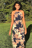 This dress is absolutely beautiful and fits perfectly because of the tie straps. It flows wit the wind and is great for special occasions . I wore it to wedding and it was definitely a show stopped . Can't wait to wear it again. - Jessica J.