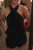 I am very glad to have bought this. It fits like a dream and is very comfortable. But that's not why I'm glad. This outfit is AT LEAST three outfits in disguise!! You can go from a business meeting wearing it on one shoulder to a day on the beach with a cute criss-cross neck just to switch it to a sexy low neck romper at night to hit the club! ALL WITH ONE OUTFIT! I love how versatile this outfit is and the best part?? IT HAS POCKETS!! - Mila D.