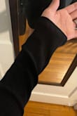 This dress is very flattering. It is ribbed but not in a too-tight scratchy way that they can be. The material is thin but not in a cheap way. I am 5'4, 120-125 pounds with a 27 inch waist. The dress came to my knees when pulled all the way taught. - Sasha W.