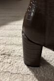 One of the boots came with the heel not attached correctly. Not only did it look off, but with it not being fully lined up with the heel, it felt so weird when trying on. Returned these and such a bummer I have to pay 5.95 fee when returning something that isn't quality. - Erica R.