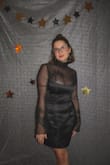 I got this dress for my witchy cocktail birthday party. It was the perfect fit for the theme. The dress is a little low cut, and I did have one nip slip, and the material does not have any stretch to it. However, it makes up for it with the beautiful detailing and sculpting fit!! - Sierra F.