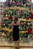The dress was elegant, and it fit so well. The slit was modest but cute, loved the BOW in front! I got so many compliments. The dress looked amazing with a black fur stole and gold heels. Would definitely recommend the dress and this website to anyone. I've never been disappointed! - Natalie Q.