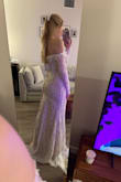 I honestly didn't expect to get such a beautiful, high-quality dress for only $130. It looks stunning, the craftsmanship is excellent, and even the garment bag it came with feels very professional. No one would ever guess the real price, it fits perfectly and looks amazing.

I also want to highlight their excellent customer support. My first package unfortunately got lost, and I couldn't locate it for almost two weeks. While I was still searching for it, the company sent me a replacement dress right away as they investigated what happened to the original shipment. This level of care and seriousness toward their customers truly surprised and impressed me.

Highly recommend! - Kristina L.