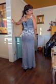 Do not be fooled by positive reviews. This is a 20 dollar dress and the quality is such. It is something you'd buy at Rainbow or Easy pickin's. I bought it on sale at 45, so it makes you feel like you are buying a dress that is of a higher quality than 45, and it is truly not. The material looks satiny and smoother on the picture. The color is lighter. It looks like a solid garment, but this is basically a mesh material with velvet leaves all over it. The lining is cheaply made and you can tell it's a cheap dress just by the weight of the bag when you get it. I can't return or exchange so I'm stuck with it. I have an event to go to and no time to get anything else.  If I were the type to do so, I'd cry, but honestly, I'm just mad. If I wanted Shein quality, I would have gone with them, but my friend actually got a better dress than this one on Shein. - Nancy D.