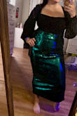 Paired this with a body suit that has balloon sleeves and it looked perfect for my holiday photos. The only downside is I left sequins everywhere I went. You couldn't noticeably tell that there were sequins missing- but I only wore it once for a few hours. Not sure how it would hold up doing a lot of dancing etc. - Leanne L.