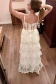 Got this on a major sale price for funzies. I feel like I wouldn't pay total full price for it. It's cute and fun. It sparkles and looks cute to twirl in. It's comfy. Maybe a tad itchy in the top. If you're between sized, pick smaller. - Victoria S.