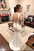 I bought about 6 dresses in total to try on, and this one was not my first choice, but OH MY GOSH. I put it on first and instantly knew it was the one! It fits like a glove, and the material is stretchy! I ordered a small and it was perfect! - Jenna T.