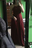 It's a little loose, but it still fits really well! The material is very lightweight and flows very nicely. Bit long for me, but with heels the length is better! Excited to wear it to prom this year! - Hannah A.