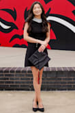 The dress fit perfectly and was very comfortable! I've worn it many times to school ceremonies and at commencement! - Mya P.