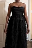 I wore this at my work holiday masquerade themed party, and it was a hit. The dress is very comfortable and lightweight. I ordered it in black, size large. - VIRNA J.