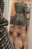 This is a cute romper. Some of the sequins did fall off when I was trying it on, so you have to be careful. I am pear shaped so I'm glad I got the large. - Ashley D.