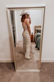This jumpsuit is everything. I wore it to my company Christmas party in the Fort Worth stockyards. The fit is incredibly flattering, and the style is stunning in person - photos honestly don't even do it justice. The fabric has just the right amount of structure while still being super comfortable, which made it easy to wear all night long. I am tall and have an athletic build and I did size up because I wanted to make sure it wasn't tight or pulling, and I'm glad I did. The bottom fit exactly like I wanted it to, though I could have gotten away with my normal size, large. The top was slightly loose on me, but it still worked beautifully and didn't take away from the overall look at all. I got compliments all night and truly felt like a model wearing this. Chic, confidence-boosting, and comfortable is a rare combo, but this jumpsuit nailed it. Lulus has my heart forever. - ReShea L.