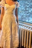 This dress is cute and flattering. I ordered it in my typical size, and it fits. It just has to be steamed. - Sylvia M.