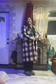 Very elegant coat and great fit! Fits very well around the arms and is not incredibly long. Great for a night out! The colors really pop out - Carolina A.