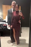 This dress is absolutely stunning. I do recommend sizing up at least one size, it does run small. Once you get the right size, the fit is incredibly flattering, snug in all the right places. I am short and didn't have time to hem, but 3.5 inch heels did the trick! The fabric has a beautiful, rich texture that photographs so well, and the color is even better in person. The high neckline balances perfectly with the slit, making it elegant yet still sexy. The back is full coverage but not lined on the top, so just lace, which is a pretty feature. I felt confident, comfortable, and dressed up all night. True showstopper, would 100% recommend. I wore a small here could have potentially gone up to a medium. (5'2, 119 lbs, 32C) - Tasha L.