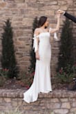 I purchased this dress for my engagement shoot. It is just as beautiful as the pictures! Material is very comfortable and doesn't feel cheap! I paired it with heels, and it was still long enough for my height! - Mackenzie K.