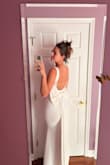 I wore this dress for our wedding rehearsal dinner last year and it was just as beautiful as the pictures! It fit perfectly and wasn't loose or too tight in any places. The only thing I didn't like was that the material used for this dress tended to get dirty very easily. And especially with it having a small train, it wasn't hard to have it get dragged through dirt. And our wedding was outside so, it got dirty pretty easily but, if you don't plan on walking through nature, you should be good! - Alexandra W.