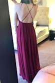 I am wearing this as a bridesmaid dress for a friends wedding this summer and I cannot wait to wear it! It's very elegant, but the open back gives it just the right amount of sexiness without being overdone. Love that the bottom of the dress is very flowy which will be perfect for a hot summer wedding. The hem does touch the floor, so it is a bit long even for me being tall with long legs, but with heels it will be perfect. I would highly recommend this dress to anyone considering it! - Lacey A.