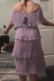 I loved this one! I ended up keeping this one due to how flattering and forgiving it was. The color is beautiful, and the fabric is light and airy. - Tressa R.