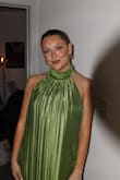 The dress is lined and had to be hemmed even with heels on (about 5'9 with heels). Runs big, I got a small and am normally medium or large. - Casey W.