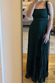 This dress in emerald green is so pretty. It's light weight, has a lot of support in the chest area, and I received SO many compliments! It is a bit long. I should have gotten it hemmed. I wore it to a black tie wedding in January and it was perfect! Can be dressed up or down. Also, the bow can be easily removed if it is not your style. However, I loved it! - Aubrey H.