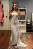 I was a little skeptical about ordering a size small since I'm 5'10" and 157 lbs, and I usually fall between a small and a medium. I wanted a more fitted look, though, and I'm so glad I went with the small; it fits like a glove. It was just slightly loose in the waist, but nothing major at all, and definitely not something that would make me return it. The fabric is very comfortable and stretchy, the material feels high quality, and it's absolutely worth the price. It's so stunning. I'm really happy I chose the size small! - Reagan R.