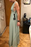 Really like the dress! It's a little heavy, but wears nicely. The colors was a little too pale with my skin, so I'll be re-ordering with a more dramatic color. Excited to wear to a wedding in May! - Haley F.