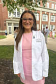 The dress fit super well! I wore it for my white coat ceremony for medical school! I got so many compliments and felt like Dr. Barbie! The material isn't the best quality, but it worked well for the event. - Ellie S.