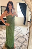 I absolutely love this dress, and it is perfect for my trip to Greece. The fabric is light and airy, which is perfect for the hot summers in Greece. The pleated design and ruching is also unique, stylish, and very Grecian. It makes me feel like a Greek Goddess! - Dina K.