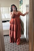 I'm five foot, so even with four inch heels it was so long on me and I was having to hold it up all night. Also I have huge boobs so they were kind of spilling out but oh well, YOLO. Anyways, it fit me perfectly and I loved it and got so many compliments. Wore it to a Mardi Gras ball. Also so so flattering. - Elisa K.