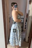 Really love this set! I'm 5'8", and the length is perfect. The material is super lightweight and breathable. Top has adjustable straps and is not too cropped. The skirt / top combo meet one another perfectly. Purchased for a work retreat event in Miami. - Destiny H.