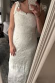 This dress is absolutely stunning!!!!
Fits PERFECTLY. True to size. A mild stretch to the design. The size L is incredibly flattering on my size 8/10 body!
It is long, which worked well for me as a 5'9 girl, but prepare to have it altered if you're on the shorter side!
The floral detail overlay is of such high quality.
Ignore the wrinkles at the bottom from tight shipping. I am confident that those will fall out with time and/or some light heat!
So excited to wear it for my rehearsal dinner. - Jessica W.