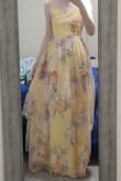 I love this dress! I usually don't wear yellow but this is such a pretty pale yellow. I am really short however, and with 3+ inch heels, it is touching the floor. So if you are short like me, you might need some really tall heels! I love that it has adjustable straps too! - Sara B.
