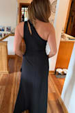 I bought this dress for a Fundraising Gala, but the material is on the thick side, and it was just loose enough around the belly that it didn't fit quite right. I really like the dress, so I'm keeping it and will have it taken in just under an inch. The shoulder strap and cut out, plus the slit in front, make it unique and sexy...but not over the top. - Kerry S.