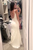 I absolutely loved this dress. I actually took two of Lulus dresses with me and will be writing a review on both. I ended up going with the other one for the sake of pictures, but this is a beautiful beach or wedding reception dress and fits perfectly - zero alterations needed. - Danae C.