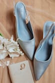 Perfect for my little chapel elopement and pairs perfectly with the Deedra dress! I selected these shoes because they were both the perfect height and my something blue. I ordered a 0.5 size down based on the other reviews, but I should have gone down 1 full size. My typical shoe size is 9, and the 8.5 fits well enough on the tightest hole. If I hadn't purchased these on final sale, I would have exchanged sizes. Beautiful, comfortable and budget-friendly! - Jasmine M.