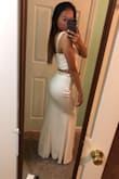 this dress is beautiful! the straps on the top and a little loose but other than that everything fits perfectly! i love it so much and it's my prom dress - Duifa L.