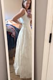 This dress is absolutely gorgeous!! Beautiful material, very well made. I did have to have the straps shortened a little bit, but nothing a seamstress can't handle. The fabric is such a nice quality, I was so shocked! 10/10 would recommend! I bought this for my elopement and can't wait to wear it! Snatched that waist as well!! - Kayla E.