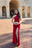This dress fits amazing. I'm 5'3, and I wore it with 4.5 inch heels, and the length of the dress was just perfect for me. It holds the body in all the right places, and the halter neck, lower back look, side slit, and the fact that it's red colored screams perfection!! Love it so much - Lisa E.